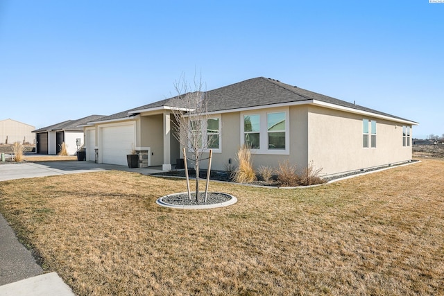 ranch-style house with driveway, a garage, a front lawn, and stucco siding