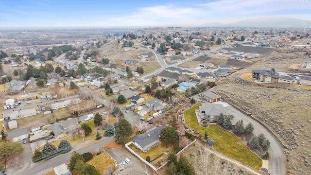 aerial view with a mountain view and a residential view