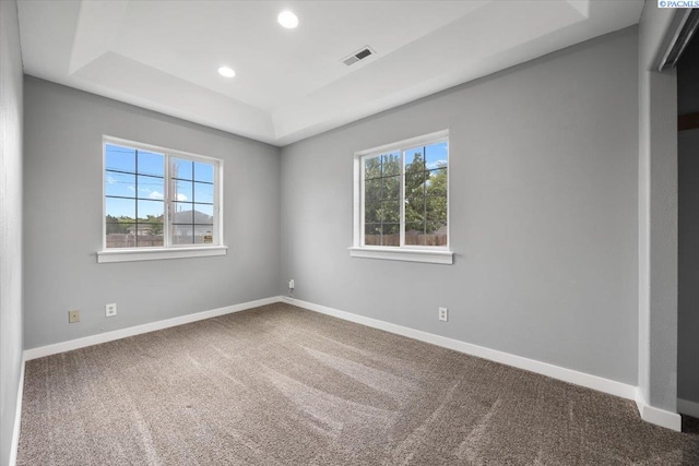823 S 5th Ave, Pasco, WA 99301 - carpeted spare room featuring a tray ceiling, plenty of natural light, and recessed lighting