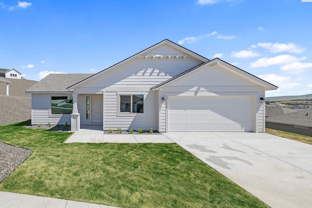 2925 S Osborne St, Kennewick, WA 99338 - single story home featuring an attached garage, driveway, and a front lawn