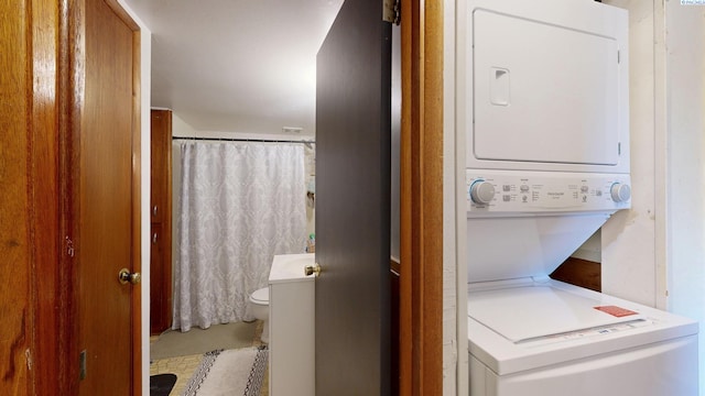 1810 NE Wheatland Dr, Pullman, WA 99163 - washroom with laundry area and stacked washing maching and dryer
