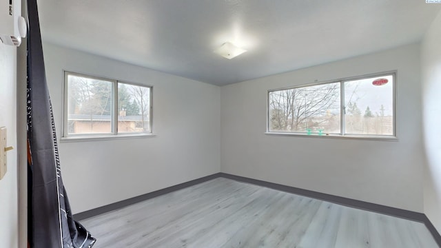 1810 NE Wheatland Dr, Pullman, WA 99163 - unfurnished room with baseboards and light wood-style floors