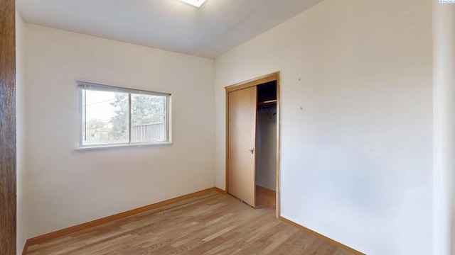 1810 NE Wheatland Dr, Pullman, WA 99163 - unfurnished bedroom featuring light wood-type flooring, baseboards, and a closet