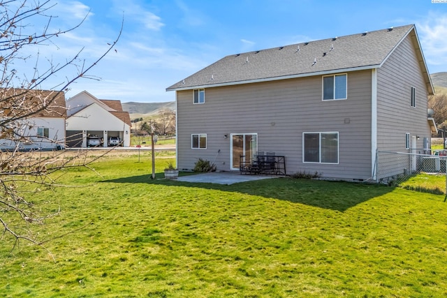 160604 Richards Rd, Prosser, WA 99350 - back of property featuring fence, a mountain view, a yard, and a patio