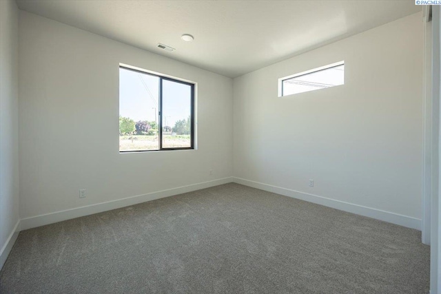 1839 S Union St, Kennewick, WA 99337 - carpeted spare room featuring baseboards