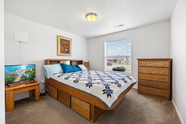 6110 Westport Ln, Pasco, WA 99301 - carpeted bedroom featuring baseboards and a textured ceiling