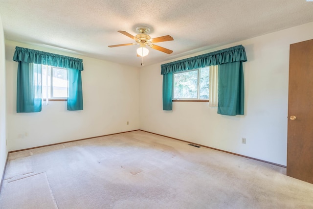 1835 NW Deane St, Pullman, WA 99163 - carpeted spare room with a ceiling fan and a textured ceiling