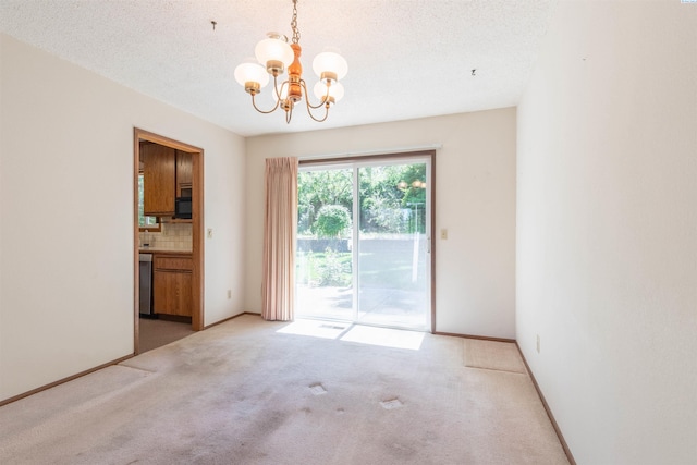 1835 NW Deane St, Pullman, WA 99163 - empty room with a chandelier, light carpet, and a textured ceiling