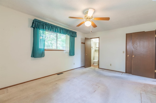 1835 NW Deane St, Pullman, WA 99163 - unfurnished bedroom featuring carpet floors, ensuite bath, and ceiling fan