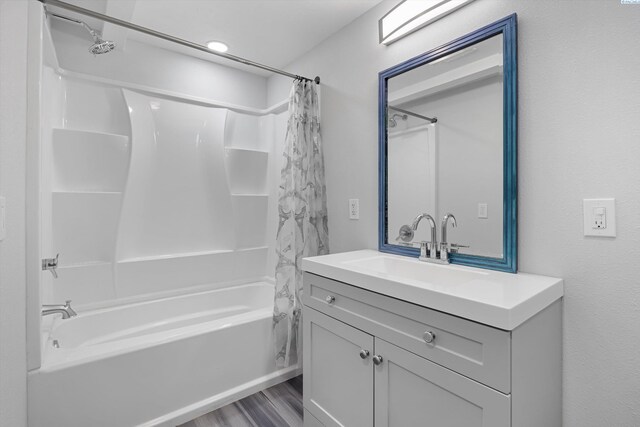 312 Mccabe St, Walla Walla, WA 99362 - bathroom featuring shower / bath combo with shower curtain, wood finished floors, and vanity