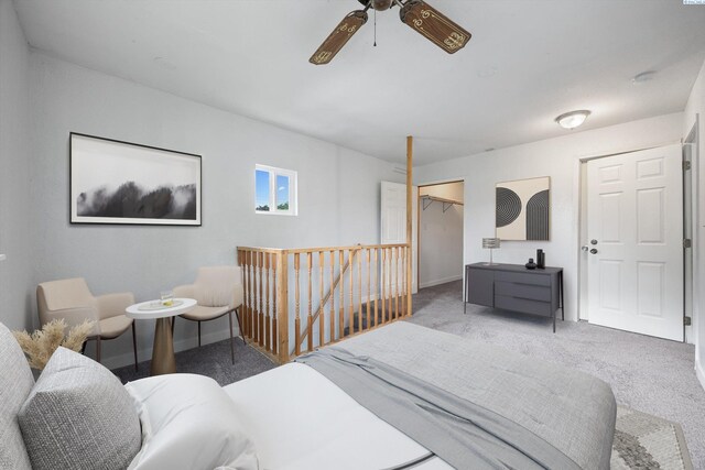 312 Mccabe St, Walla Walla, WA 99362 - carpeted bedroom featuring a ceiling fan, a spacious closet, baseboards, and a closet