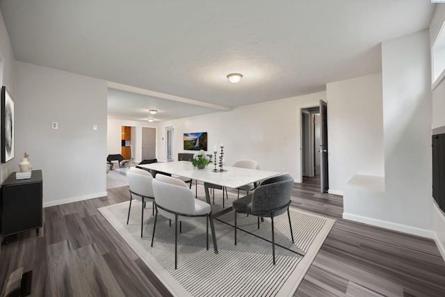 312 Mccabe St, Walla Walla, WA 99362 - dining room featuring dark wood-type flooring and baseboards