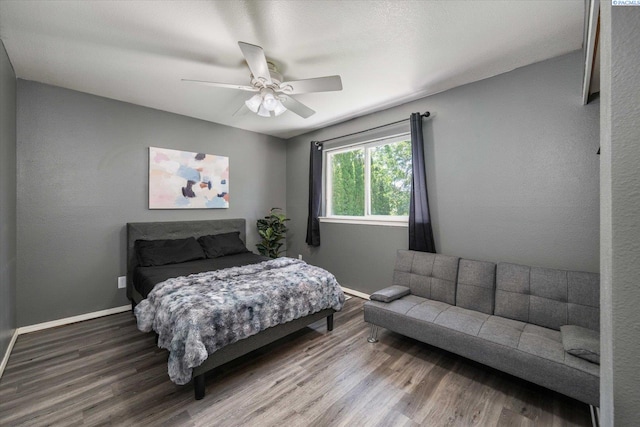 2330 Hummingbird Ln, West Richland, WA 99353 - bedroom featuring wood finished floors and ceiling fan