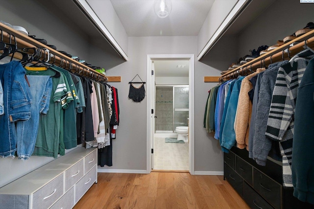 2330 Hummingbird Ln, West Richland, WA 99353 - walk in closet featuring wood finished floors