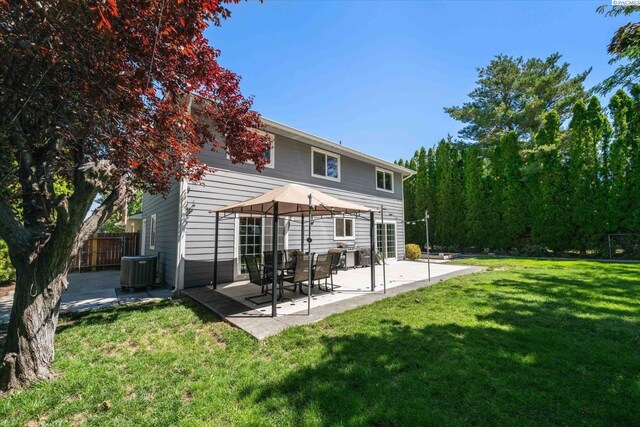 2330 Hummingbird Ln, West Richland, WA 99353 - back of house featuring a patio