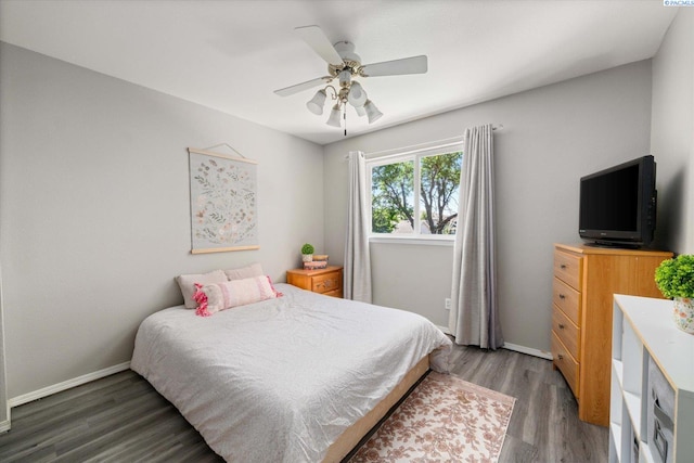 2330 Hummingbird Ln, West Richland, WA 99353 - bedroom with wood finished floors and a ceiling fan