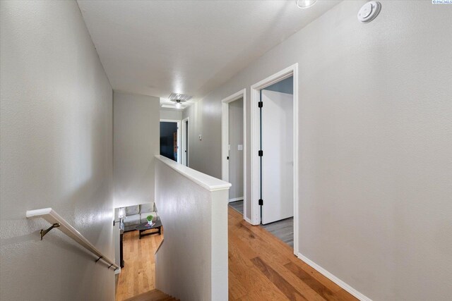 2330 Hummingbird Ln, West Richland, WA 99353 - stairway featuring wood finished floors and baseboards