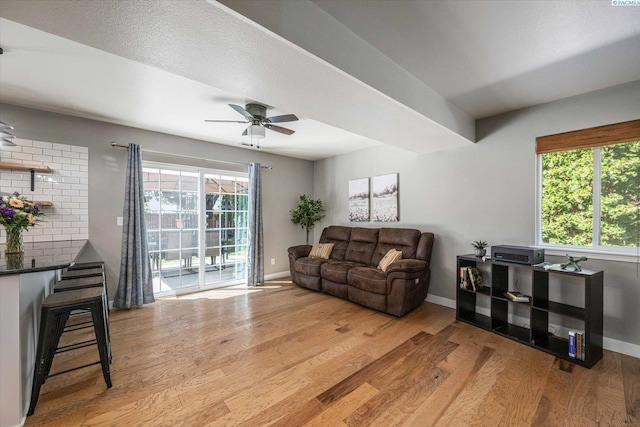 2330 Hummingbird Ln, West Richland, WA 99353 - living room featuring wood finished floors, plenty of natural light, and ceiling fan