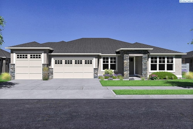 prairie-style home featuring a garage