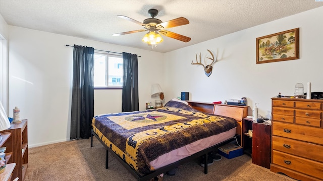 2113 Rainier Ave, Richland, WA 99354 - bedroom featuring baseboards, carpet floors, a textured ceiling, and ceiling fan