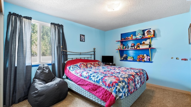 2113 Rainier Ave, Richland, WA 99354 - bedroom with baseboards, carpet floors, and a textured ceiling