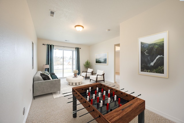 living room with light colored carpet