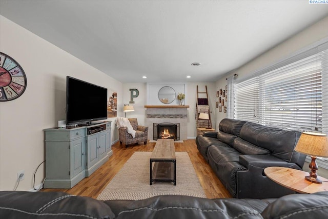 living room with light hardwood / wood-style flooring