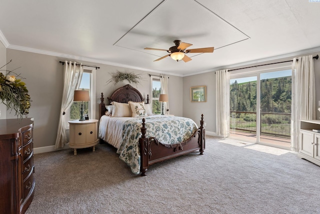 bedroom with carpet flooring, access to outside, and multiple windows