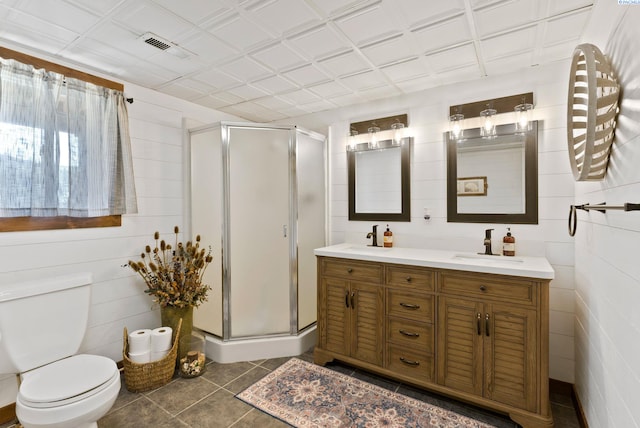 3202 S Palouse River Rd, Colfax, WA 99111 - bathroom with double vanity, a stall shower, and tile patterned floors