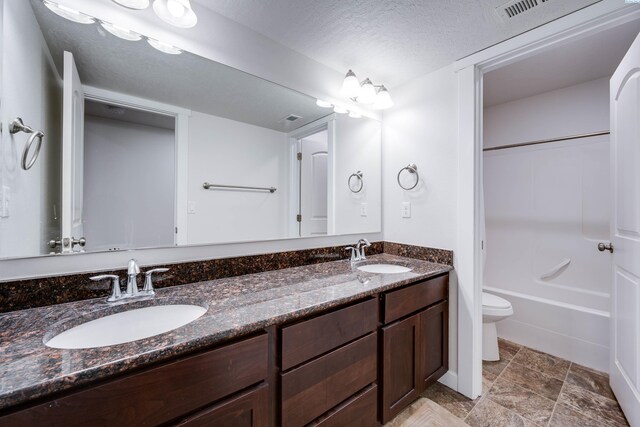 1390 SW Panorama Dr, Pullman, WA 99163 - bathroom with double vanity, toilet, and  shower combination