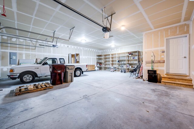 1390 SW Panorama Dr, Pullman, WA 99163 - garage with electric panel and a garage door opener