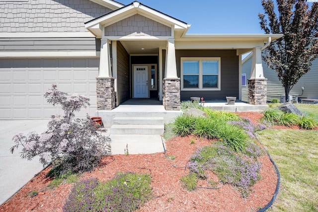 1390 SW Panorama Dr, Pullman, WA 99163 - doorway to property with covered porch and a garage