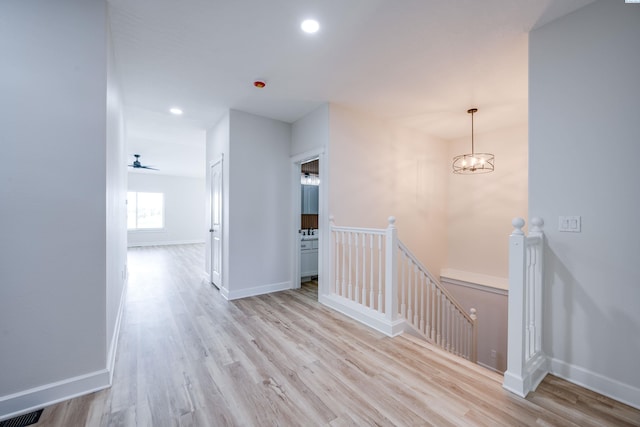 1390 SW Panorama Dr, Pullman, WA 99163 - corridor featuring an upstairs landing, light wood finished floors, recessed lighting, and baseboards