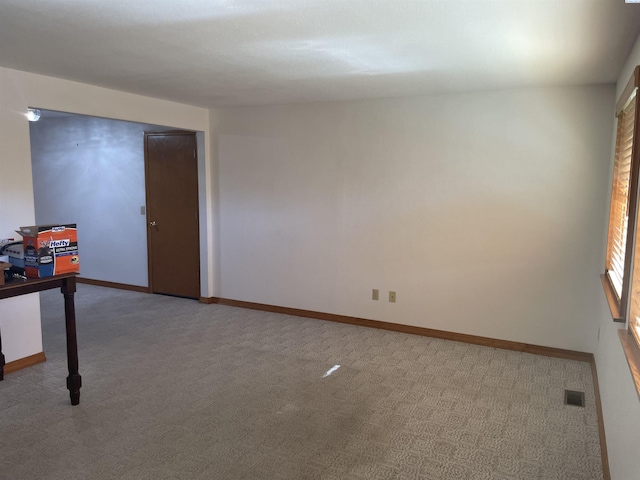 2901 S Lyle St, Kennewick, WA 99337 - spare room with baseboards, light colored carpet, and visible vents