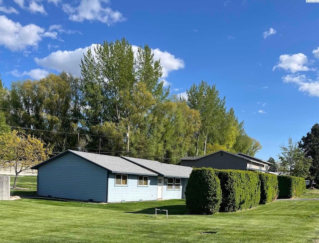 2901 S Lyle St, Kennewick, WA 99337 - back of house featuring a yard