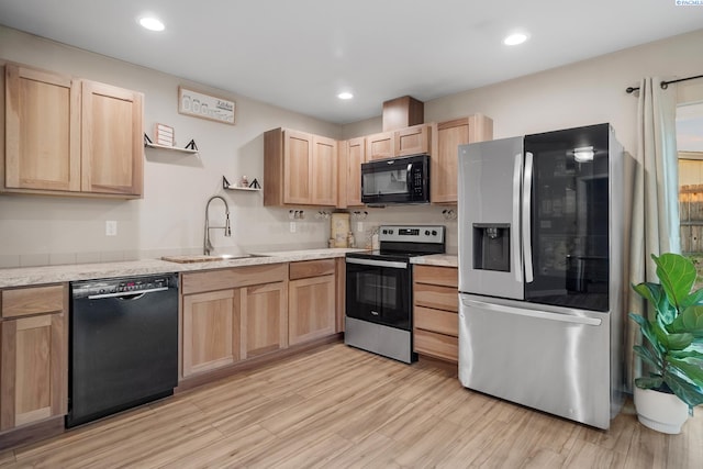 405 Whitefish Ln, Pasco, WA 99301 - kitchen featuring black appliances, light brown cabinetry, a sink, open shelves, and light countertops