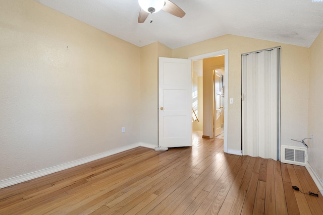 1515 Hains Ave, Richland, WA 99354 - unfurnished room with lofted ceiling, ceiling fan, visible vents, baseboards, and light wood-style floors