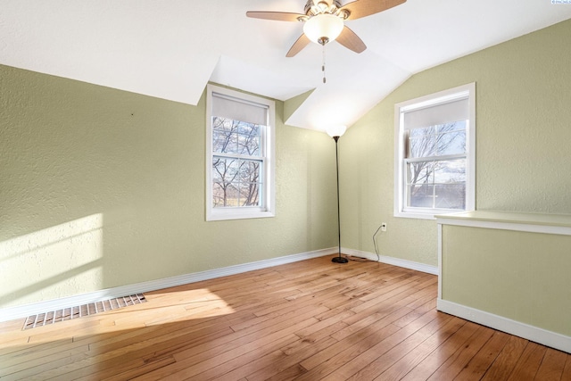 1515 Hains Ave, Richland, WA 99354 - bonus room featuring lofted ceiling, hardwood / wood-style flooring, visible vents, and a healthy amount of sunlight