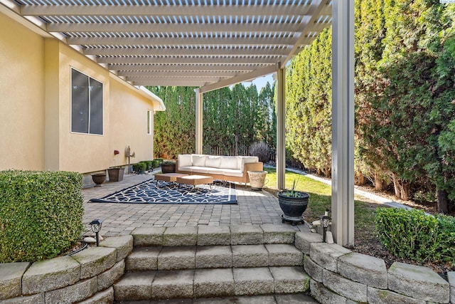 view of patio / terrace featuring an outdoor living space and a pergola