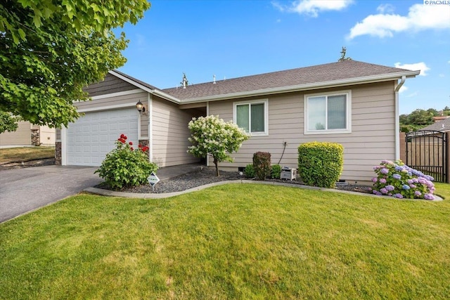 5709 W 23rd Ave, Kennewick, WA 99338 - ranch-style home featuring driveway, a garage, and a front yard