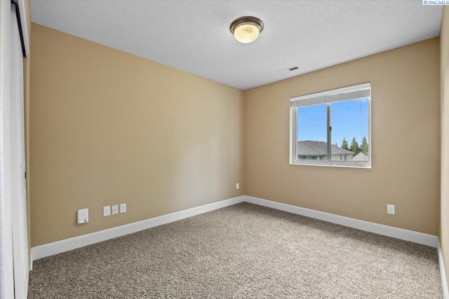 5709 W 23rd Ave, Kennewick, WA 99338 - unfurnished room with carpet and a textured ceiling