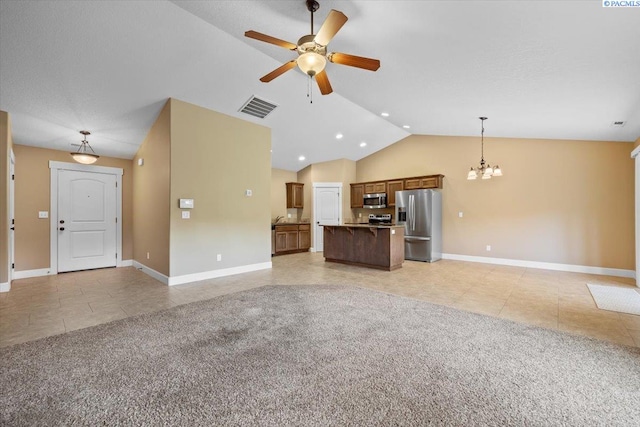 5709 W 23rd Ave, Kennewick, WA 99338 - unfurnished living room with light tile patterned floors, a chandelier, ceiling fan, recessed lighting, and high vaulted ceiling