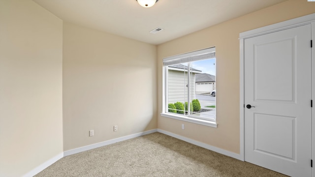 3245 S Palouse St, Kennewick, WA 99337 - empty room featuring carpet flooring and baseboards