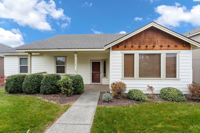 view of front of property with a front lawn