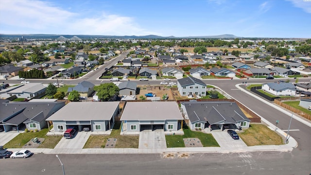 414 Whitefish Ln, Pasco, WA 99301 - aerial perspective of suburban area featuring a mountainous background