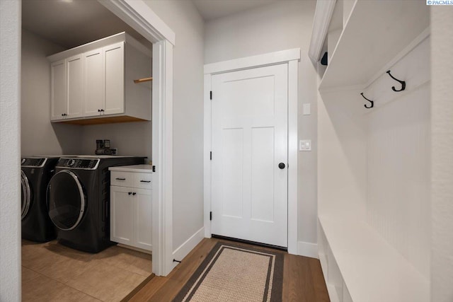5770 W 40th Ave, Kennewick, WA 99338 - laundry area with cabinet space, independent washer and dryer, and light wood-style floors