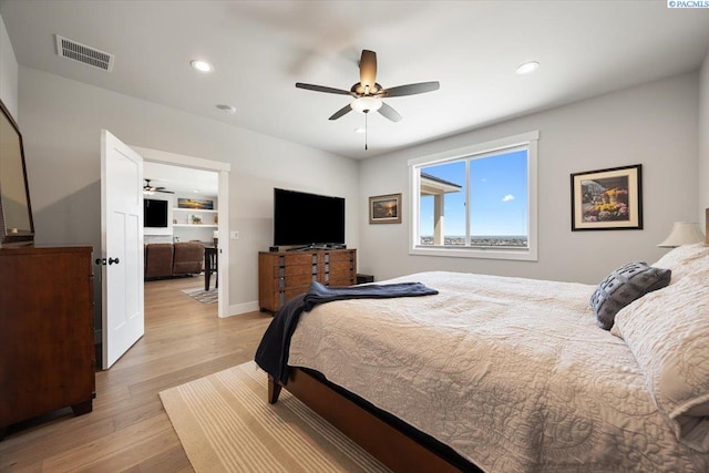 5770 W 40th Ave, Kennewick, WA 99338 - bedroom featuring wood finished floors, recessed lighting, and a ceiling fan