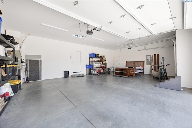 5770 W 40th Ave, Kennewick, WA 99338 - garage featuring a garage door opener and electric panel