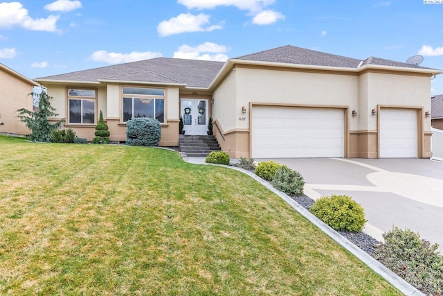 view of front of house featuring driveway, a front yard, french doors, stucco siding, and an attached garage