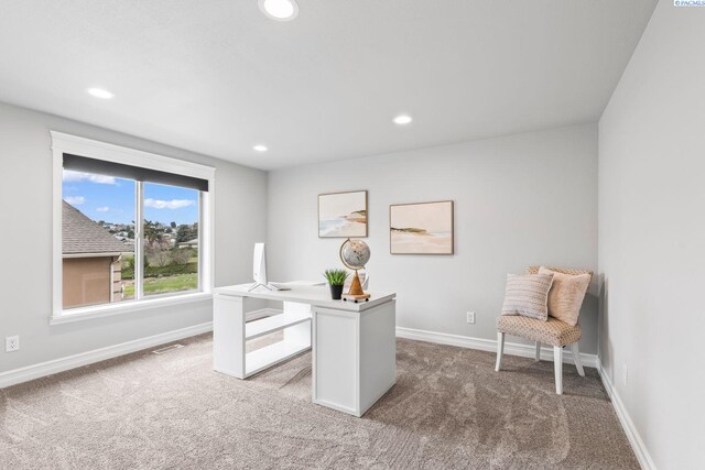 office space featuring baseboards, recessed lighting, and carpet